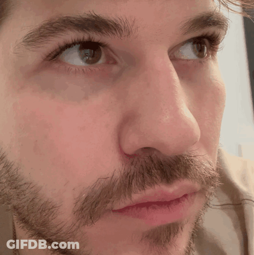 Close Up Of Bearded Man With Red Lips GIF