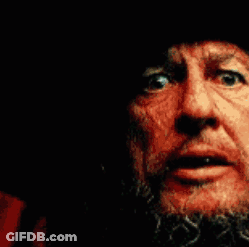 Close-Up Of Bearded Person Showing Teeth GIF