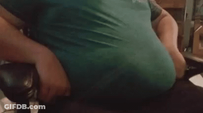 Close Up Of Belly With Large Belly Button GIF