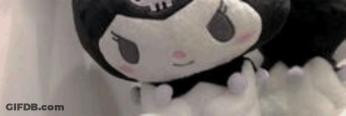Close Up Of Black And White Stuffed Animal GIF