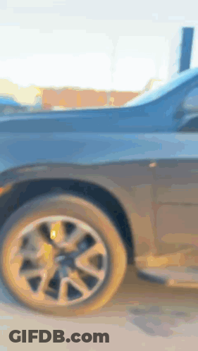 Close Up Of Black Car Wheel And Tire GIF