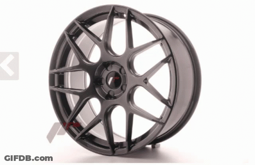 Close Up Of Black Wheel With Right Arrow GIF