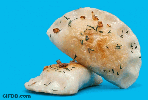 Close Up Of Bread On Blue Surface GIF