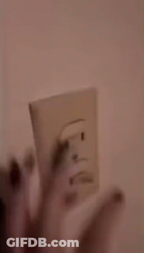 Close Up Of Brown Wall With Shadow Of Person GIF