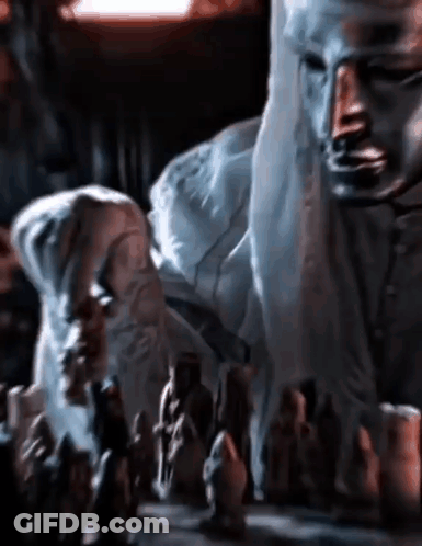 Close Up Of Chess Board With Statue GIF