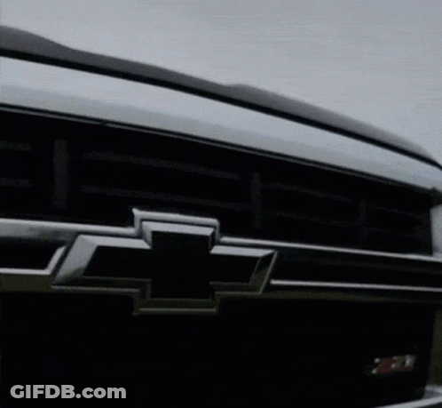 Close Up Of Chevrolet Emblem On Car GIF