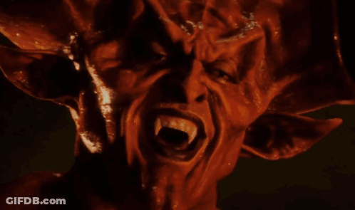 Close Up Of Devil Face With Fangs GIF