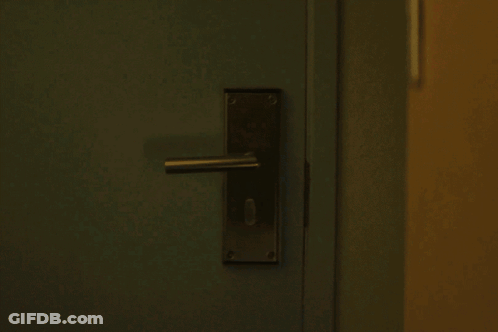 Close Up Of Door Handle With Key GIF