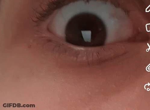 Close Up Of Eye With Icons GIF
