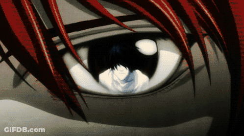 Close Up Of Eye With Red Hair And White Pupil GIF