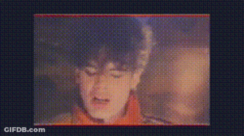Close Up Of Face On Screen With Dots GIF