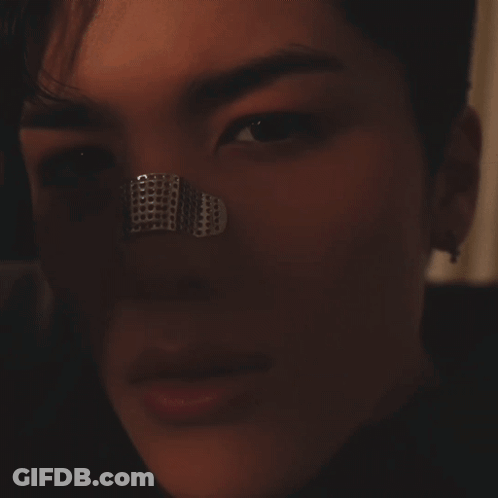 Close Up Of Face With Band On Nose GIF