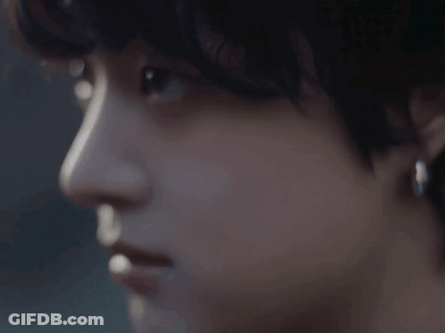 Close Up Of Face With Earrings GIF