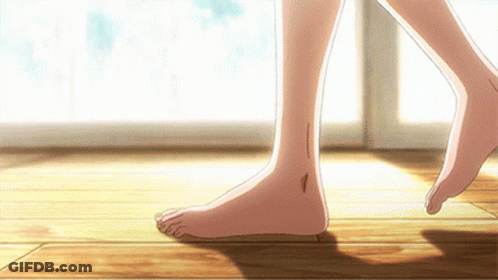 Close-Up Of Feet Walking On Wooden Floor GIF