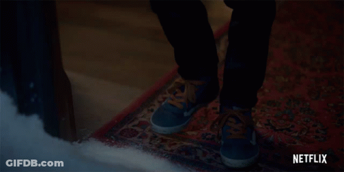 Close Up Of Feet With Netflix Logo GIF