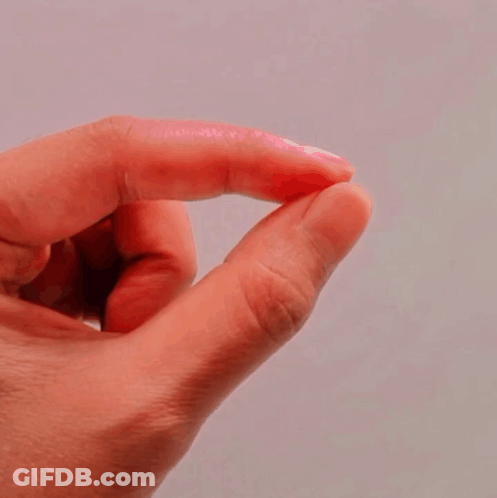 Close Up Of Finger With Pink Shimmer GIF