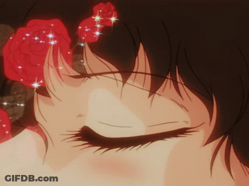 Close Up Of Girl's Eye With Red Rose On Head GIF