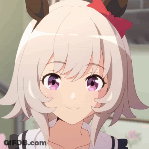 Close Up Of Girl's Face With Red Bow In Hair GIF