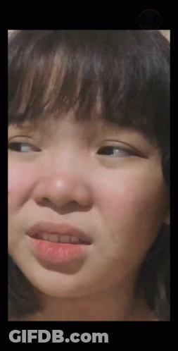 Close Up Of Girl With Slight Smile GIF