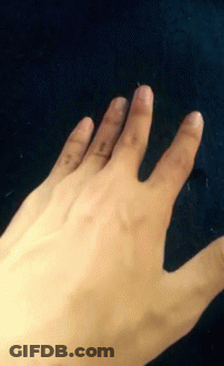 Close Up Of Hand On Black Background GIF