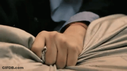 Close Up Of Hand On Fabric GIF