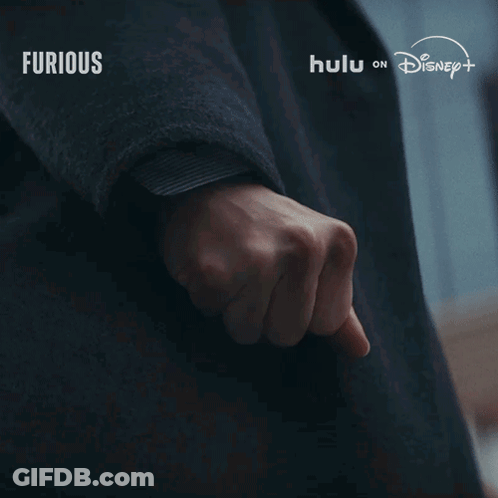 Close Up Of Hand With Furious Behind It GIF