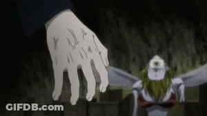Close Up Of Hand With Tattoo And Monster In Background GIF
