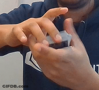 Close Up Of Hands Holding Small Object GIF