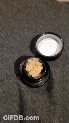 Close Up Of Jar Of Food With Lid GIF