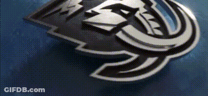 Close Up Of Logo On Blue Surface GIF