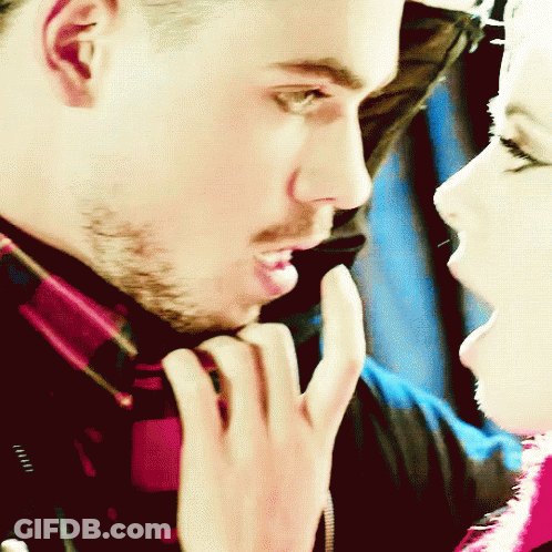 Close Up Of Man And Woman's Faces GIF