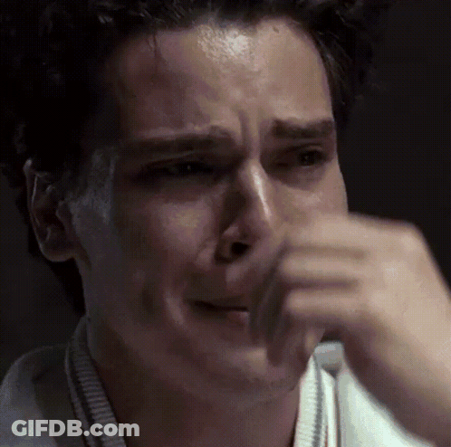 Close Up Of Man Crying With Hand On Face GIF