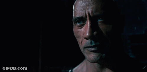 Close Up Of Man Face And Eyes In Dark GIF