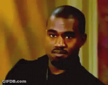 Close Up Of Man Face Saying Kanye GIF