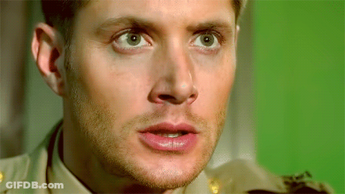 Close Up Of Man Face With Green Background GIF