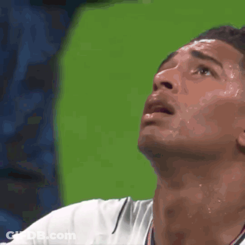 Close Up Of Man Face With Green Background GIF