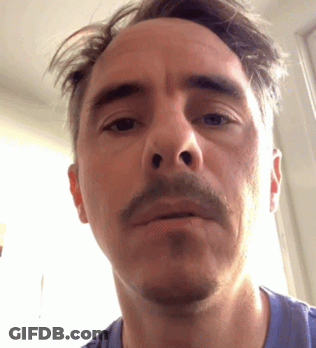 Close Up Of Man In Blue Shirt GIF