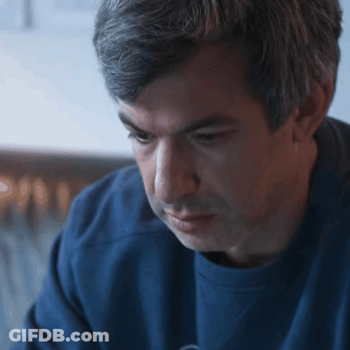 Close Up Of Man In Blue Shirt GIF