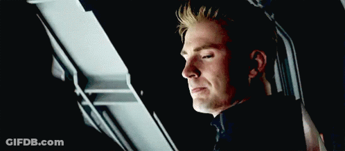 Close Up Of Man In Dark Room GIF