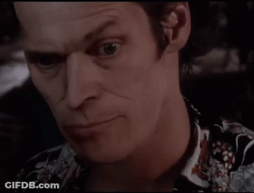 Close Up Of Man In Floral Shirt GIF