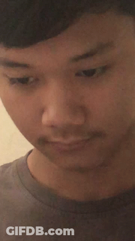 Close Up Of Man In Gray Shirt GIF