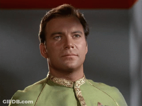 Close Up Of Man In Green Shirt GIF