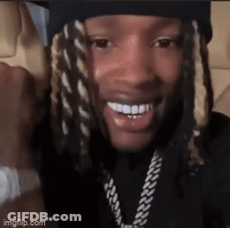 Close Up Of Man In Hat And Necklace GIF
