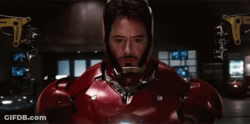 Close Up Of Man In Red And Gold Iron Man Suit GIF