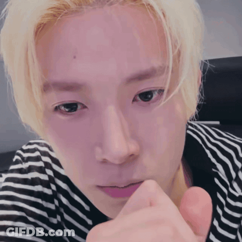 Close Up Of Man In Striped Shirt GIF