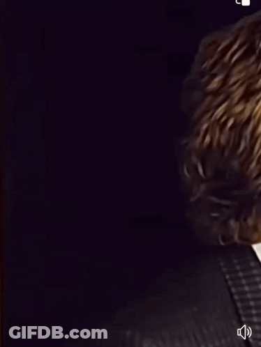 Close Up Of Man In Suit Looking Up At Sky GIF