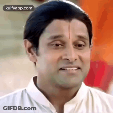 Close Up Of Man In White Shirt GIF
