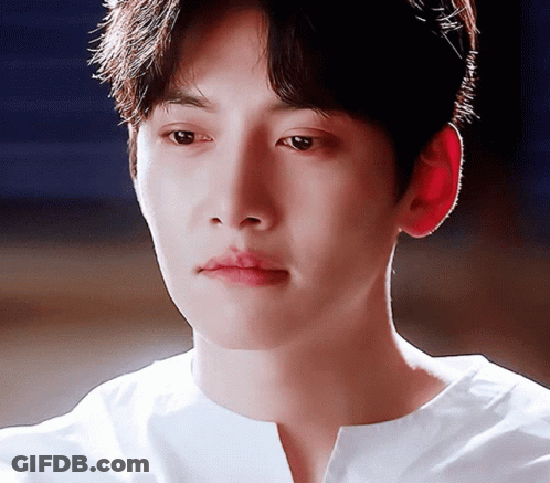 Close Up Of Man In White Shirt GIF