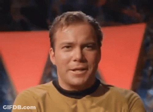 Close Up Of Man In Yellow Shirt And Black Collar GIF