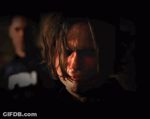 Close Up Of Man's Bloodied Face GIF